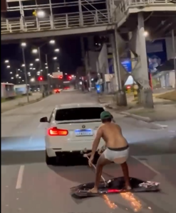 PERIGO: Influenciador é puxado por uma BMW, simulando surf na Av. Cristiano Machado, em BH